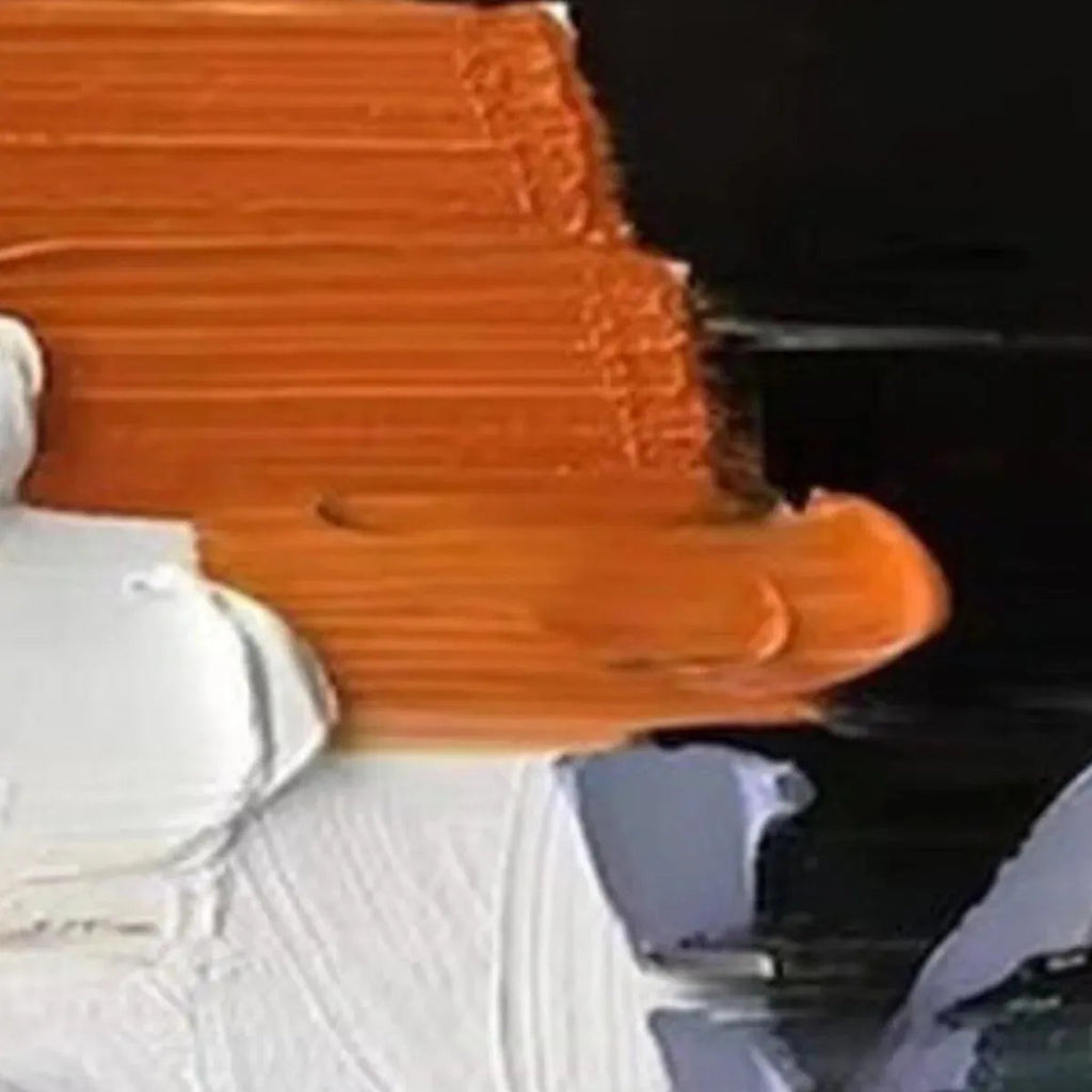 Close up of Isabella Rossi's Orange Burst painting showing thick impasto strokes of orange, white, and black.