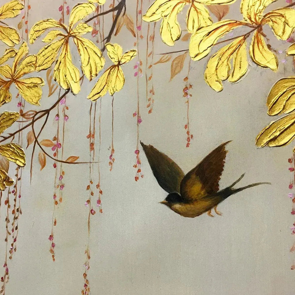 Close-up detail of Golden Garden painting: textured gold leaves, pink blossoms, and a bird in flight by Chen Liu.
