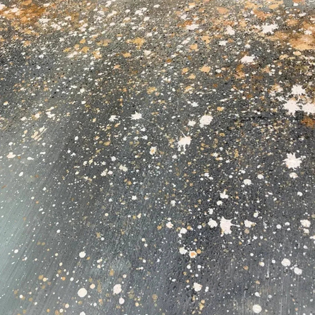 Close-up: Textured Aurora Dust abstract ocean painting with speckled grey, white, gold, brown.