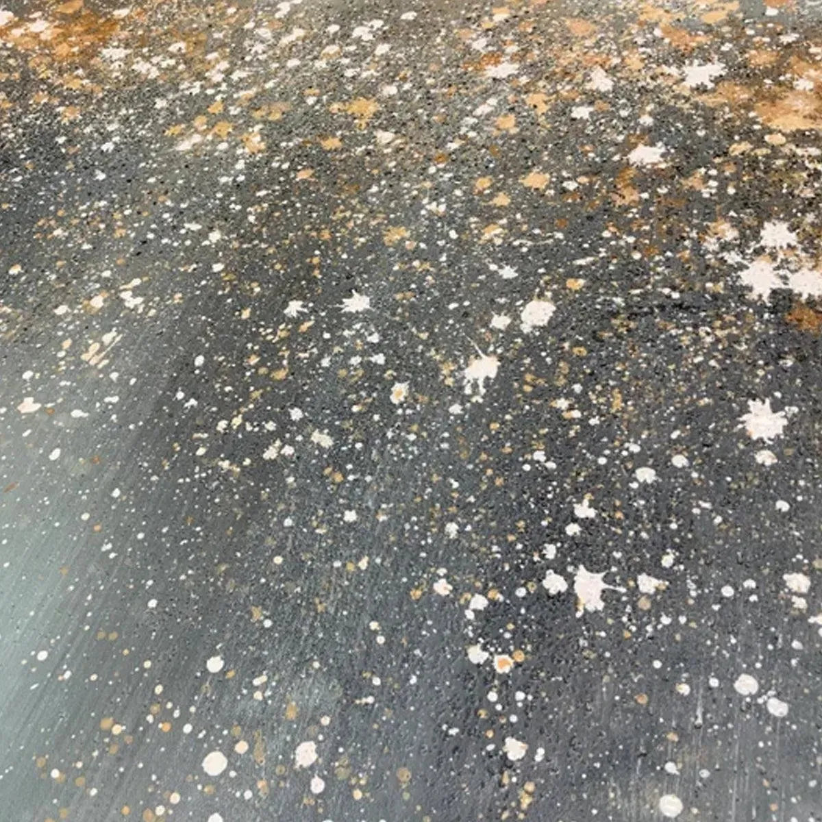Close-up: Textured Aurora Dust abstract ocean painting with speckled grey, white, gold, brown.