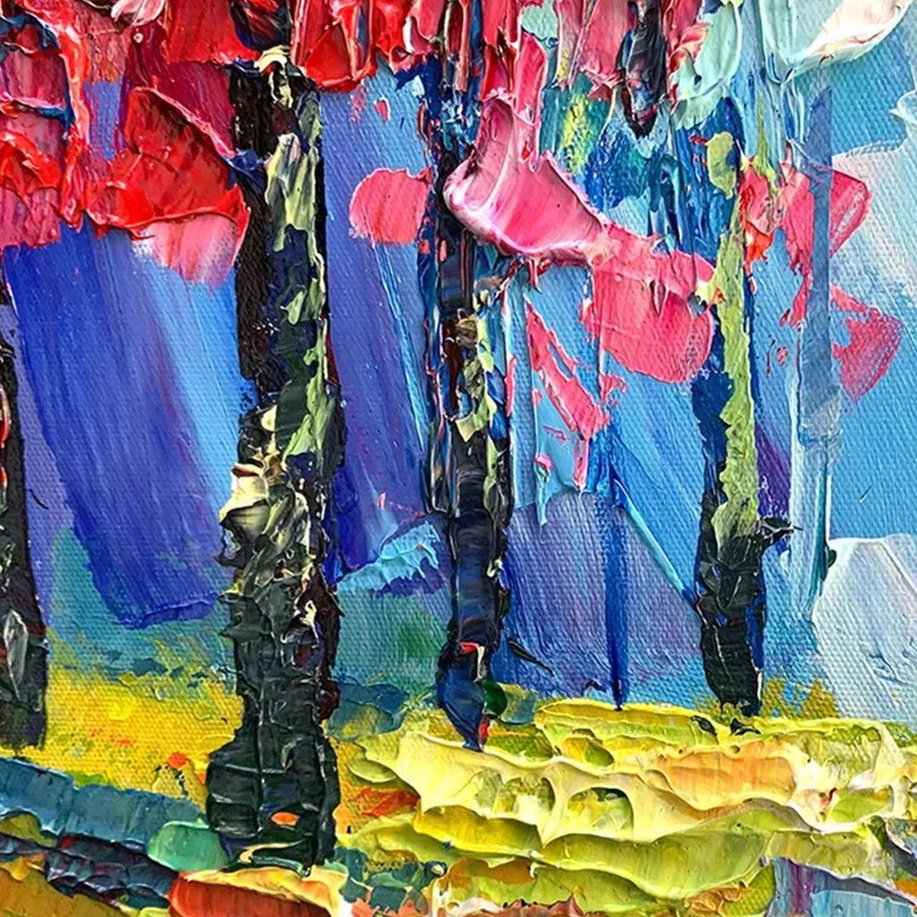 Close-up detail of 'Autumn Walk' impasto oil painting showing thick textured brushstrokes in blue sky and red foliage.
