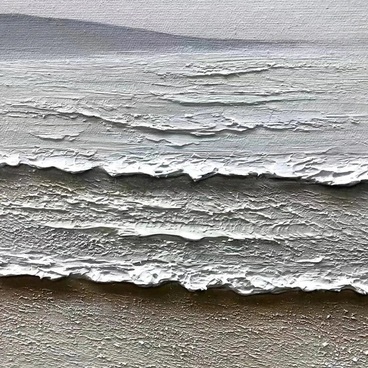Close-up of 'Whispering Tides' painting showing thick impasto texture of beige sand and white frothy waves.