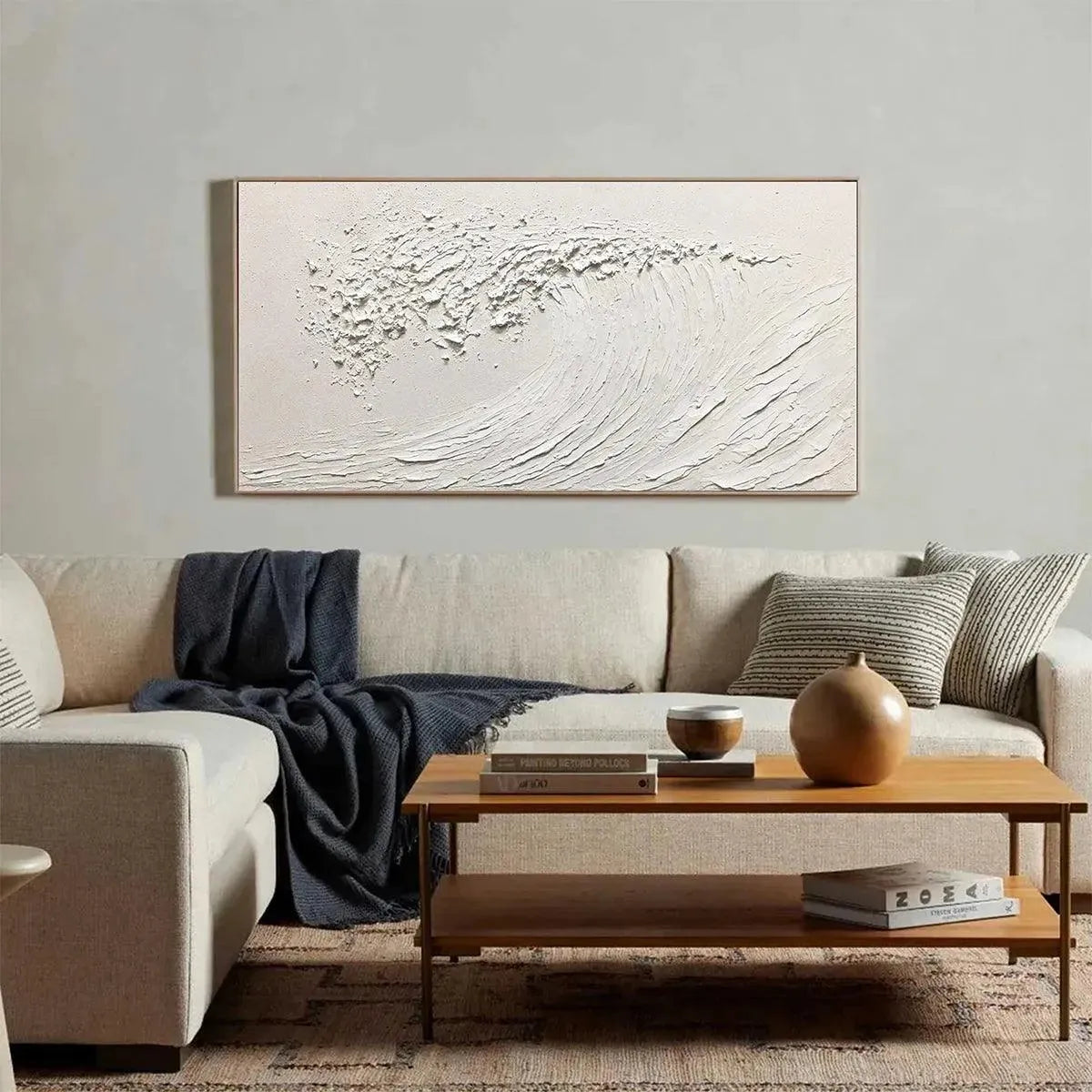 White Wave textured painting by Liam O'Connell, displayed in a living room. Minimalist ocean wave art, Wabi Sabi aesthetic.