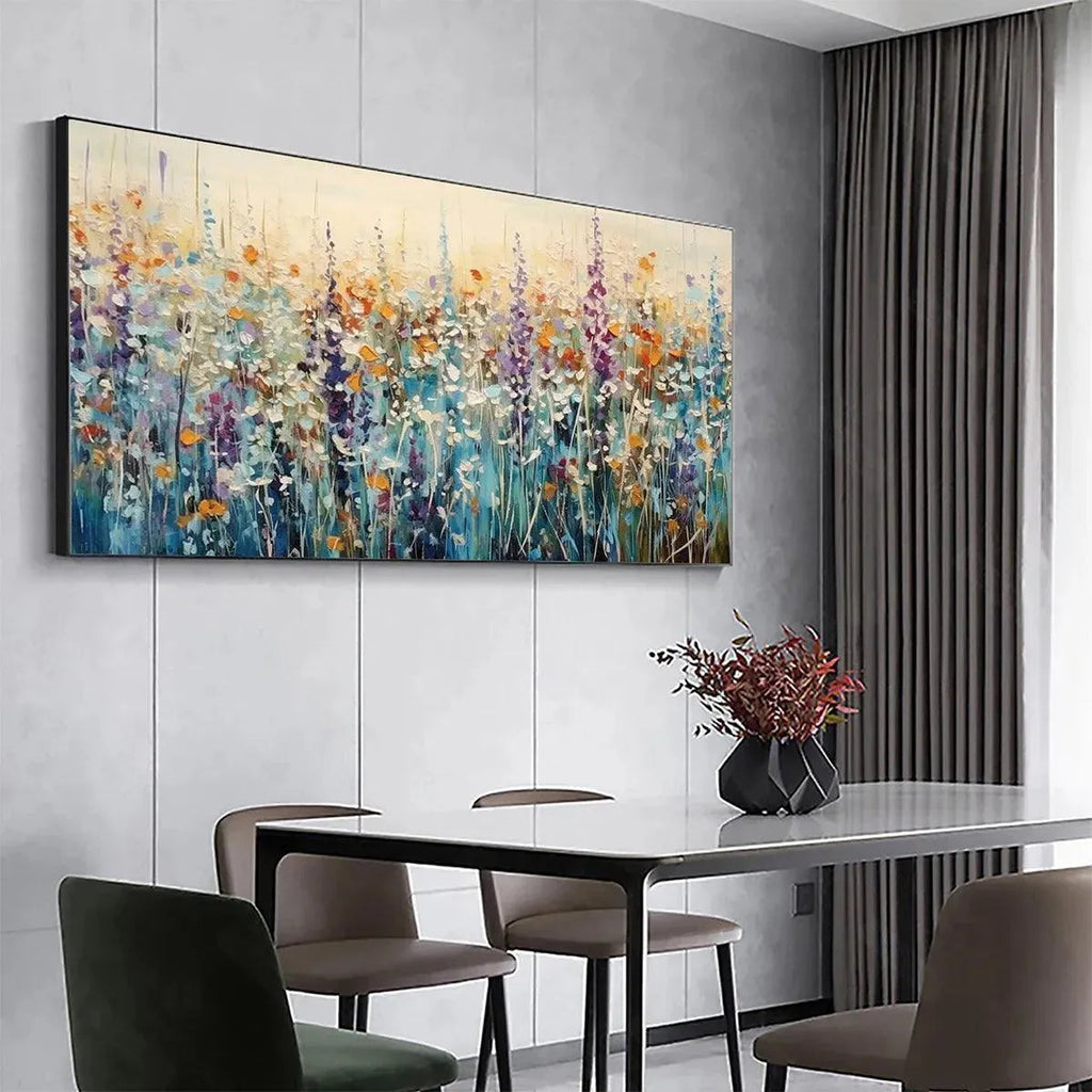 WILD MEADOW: Isabella Rossi's impasto painting of a horizontal wildflower meadow above a dining table.