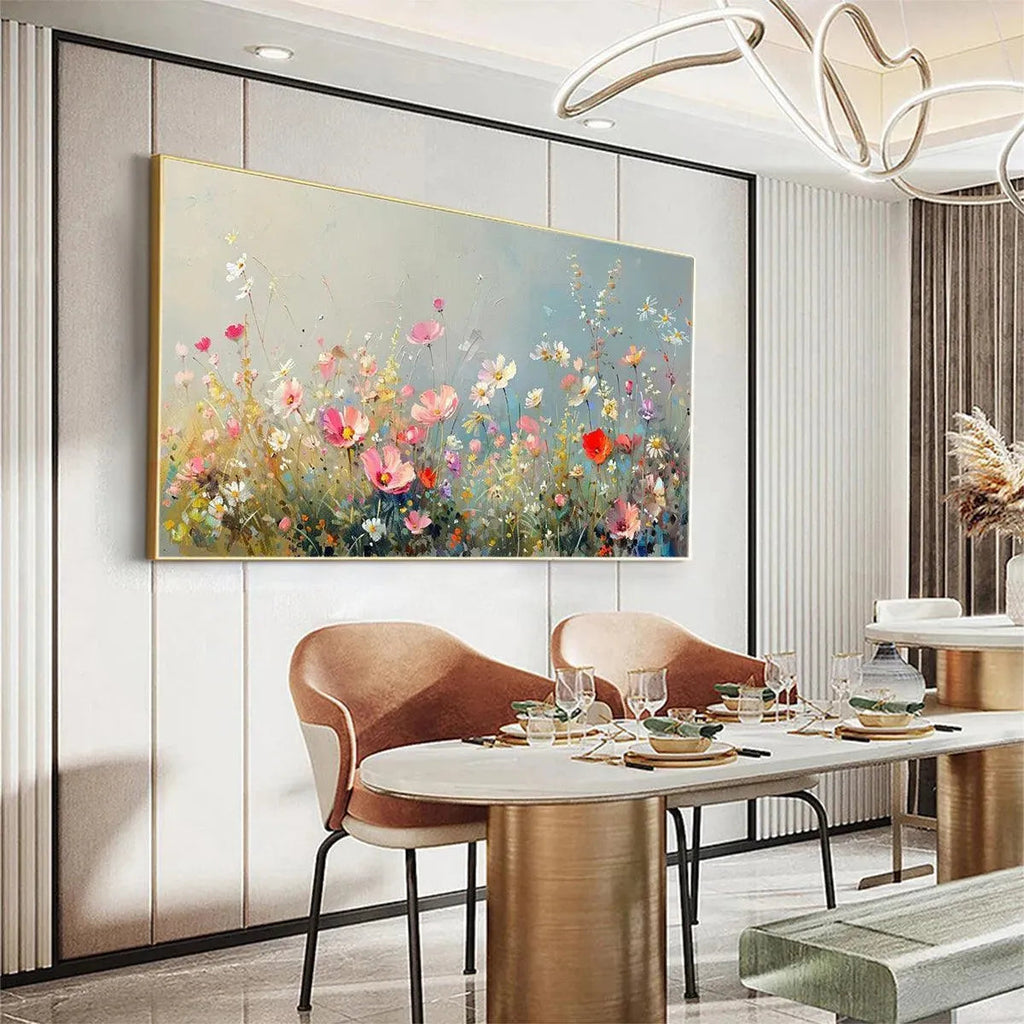 WILD MEADOW: Isabella Rossi impasto floral painting displayed above dining table in a modern dining room.