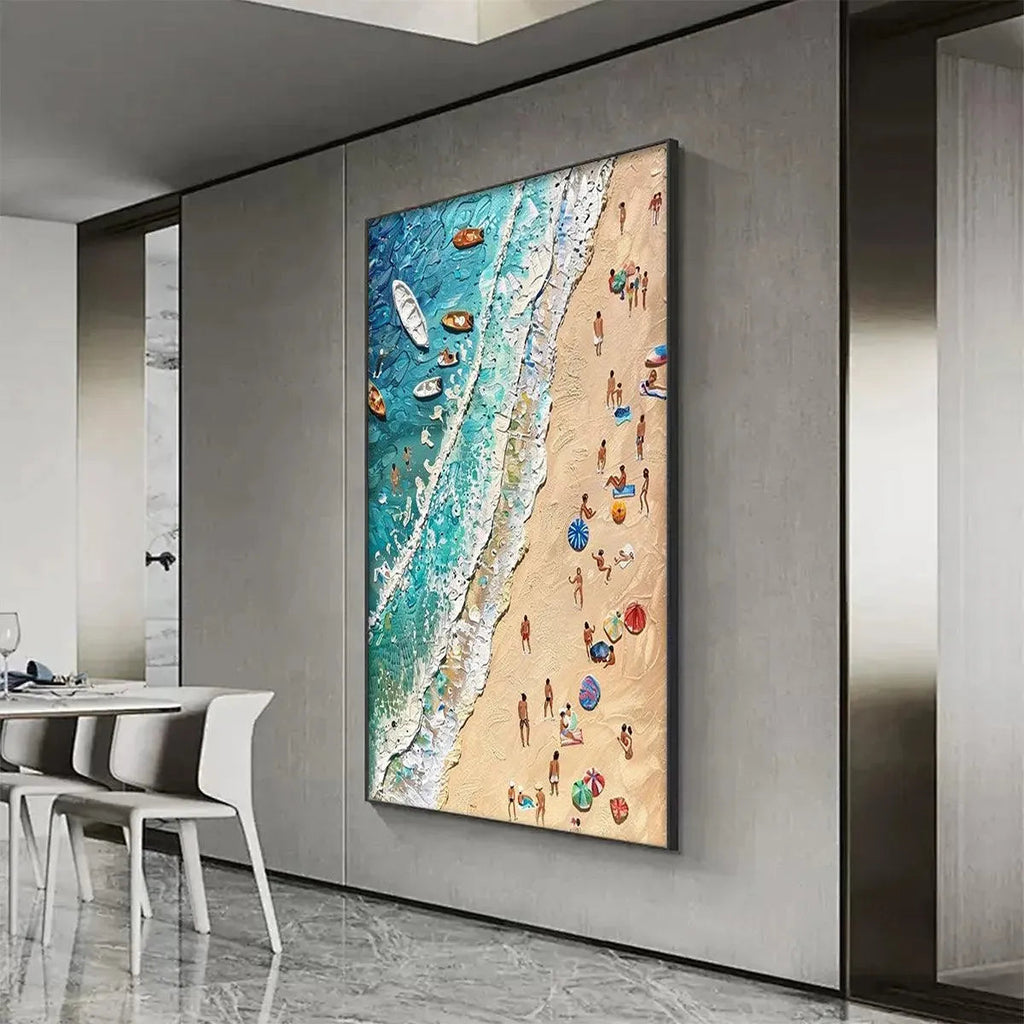 Textured painting of aerial beach scene with blue waves, sand, and colorful figures enjoying the sun. Boats offshore.