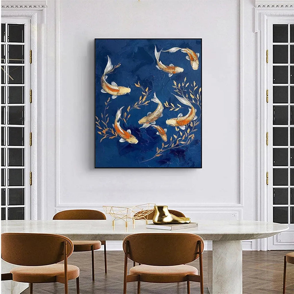 Golden Koi vertical painting on rich blue, with gold fish and foliage, complementing a modern dining room.