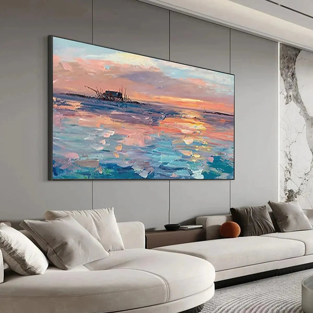 Dusk Reflections panoramic coastal sunset art with shipwreck, large scale in modern living room above gray sectional sofa.