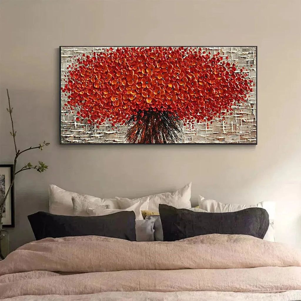 Textured Crimson Burst impasto floral painting by Isabella Rossi, showcased horizontally above a bed in a modern bedroom.