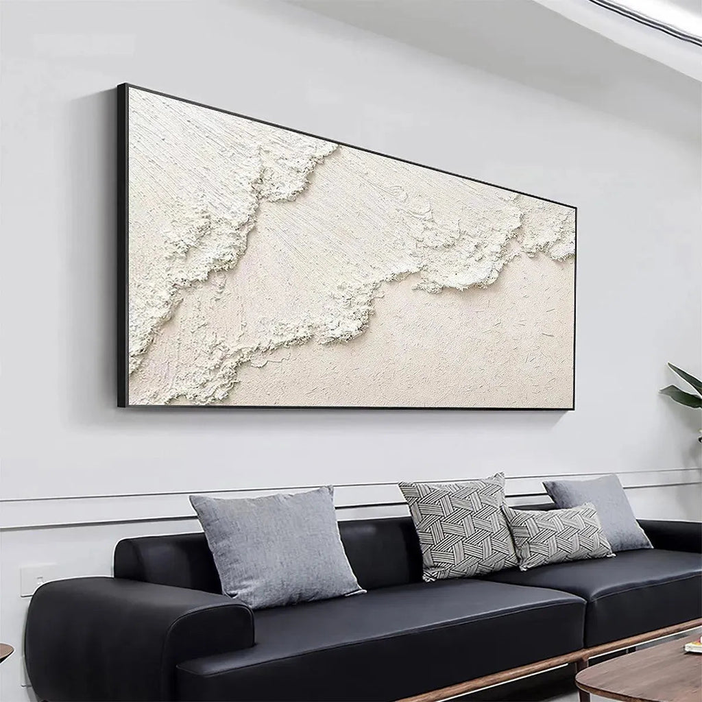 WHITE CREST: Textured white impasto seascape painting by Isabella Rossi. Coastal wall art above modern sofa.