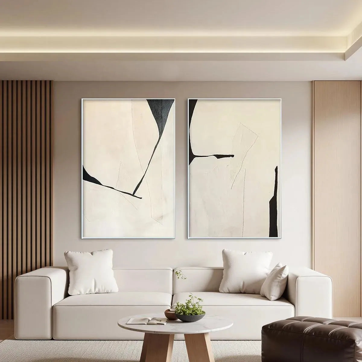 Set of 2 vertical minimalist abstract paintings with black lines on beige background, displayed above a modern sofa.