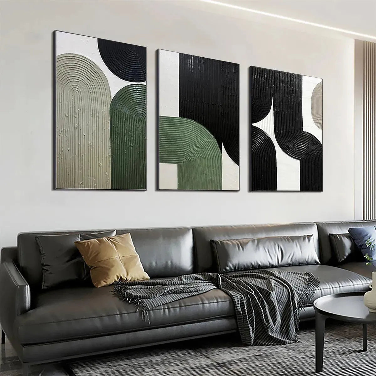 ARCHES TRIPTYCH: Textured minimalist arches in green, black, white & beige above grey sofa.
