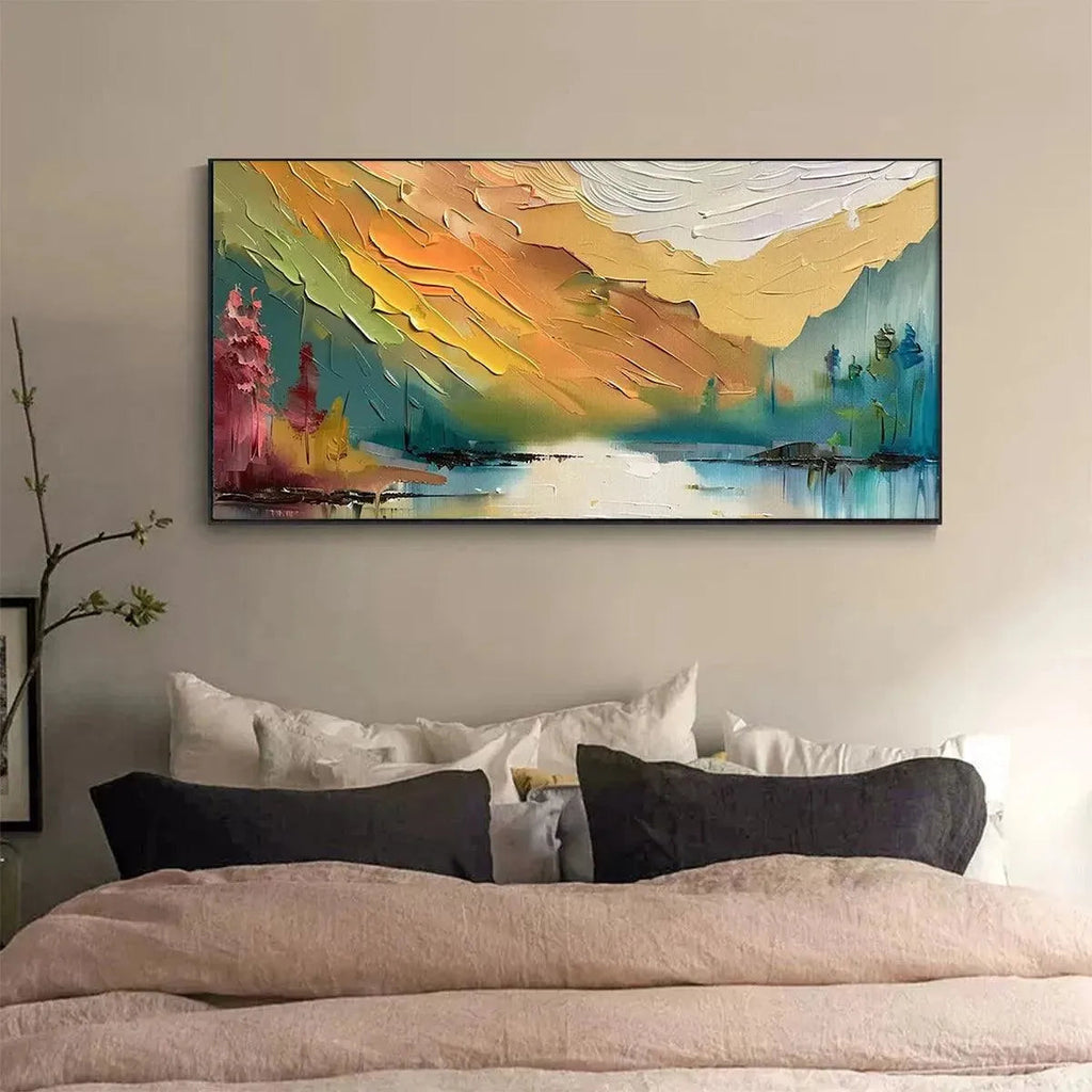 Isabella Rossi's Vibrant 'Autumn Valley' textured impasto landscape painting above bed in a modern bedroom.