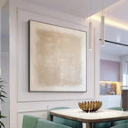 Desert Sands painting by Javier Ramirez, beige minimalist artwork in a black frame, perfect for modern spaces