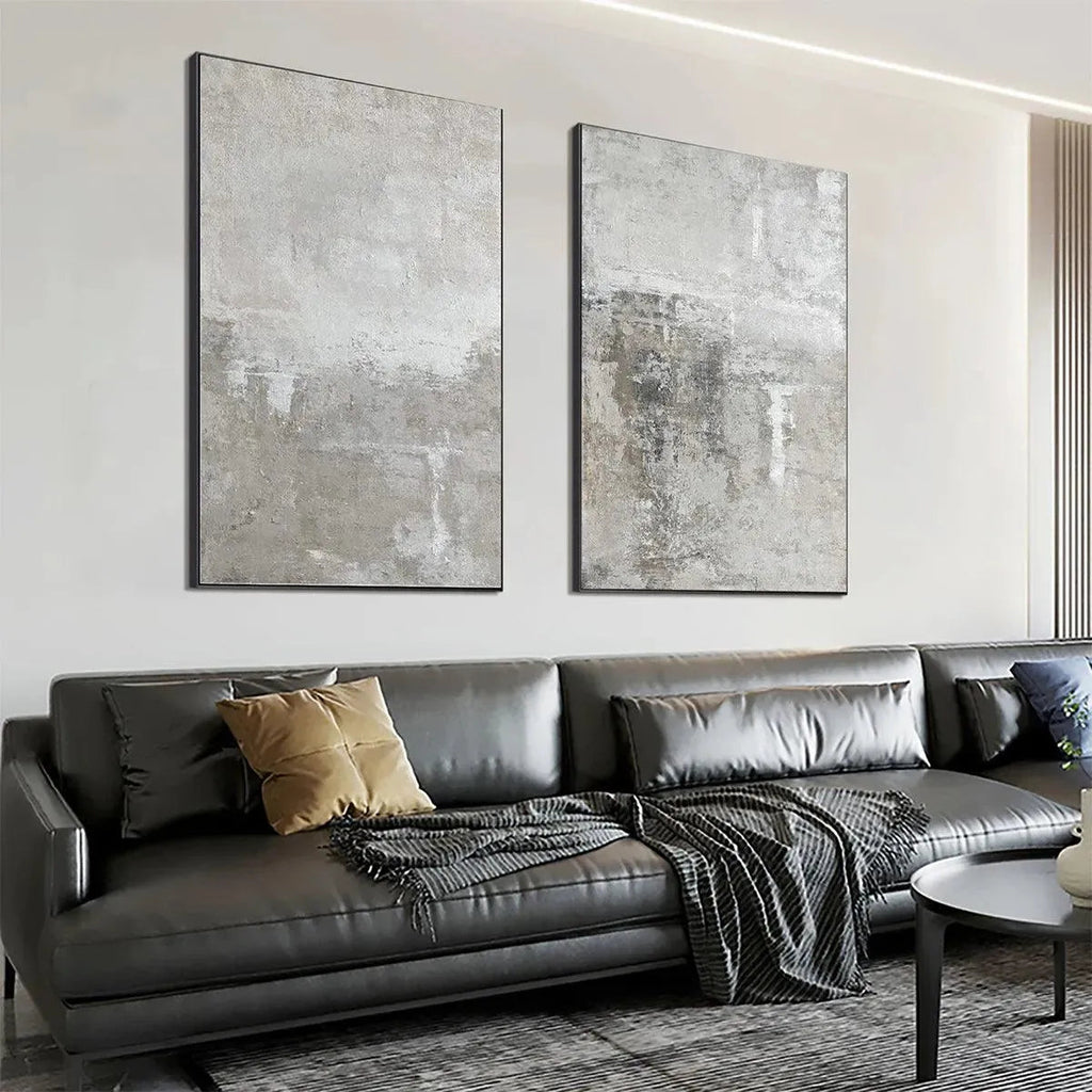 Javier Ramirez Grey Abstract Textured Diptych on a wall, featuring two vertical grey abstract paintings, modern home decor