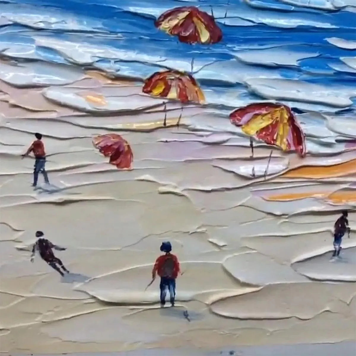 Liam O'Connell's Seaside Celebration beach painting, featuring colorful umbrellas, figures, and textured impasto art.