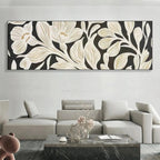 Golden Floral Panoramic wall art: stylized cream & gold flowers/leaves on black. Modern living room decor.
