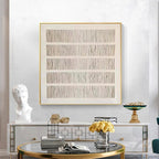 Textured Beige minimalist wall art with linear gray texture in gold frame, showcasing elegant modern design.