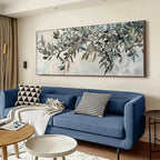 Liam O'Connell's panoramic olive branch painting on wall above blue sofa