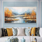 Golden Autumn Valley painting: golden trees, blue river, misty mountains, framed above a living room sofa.