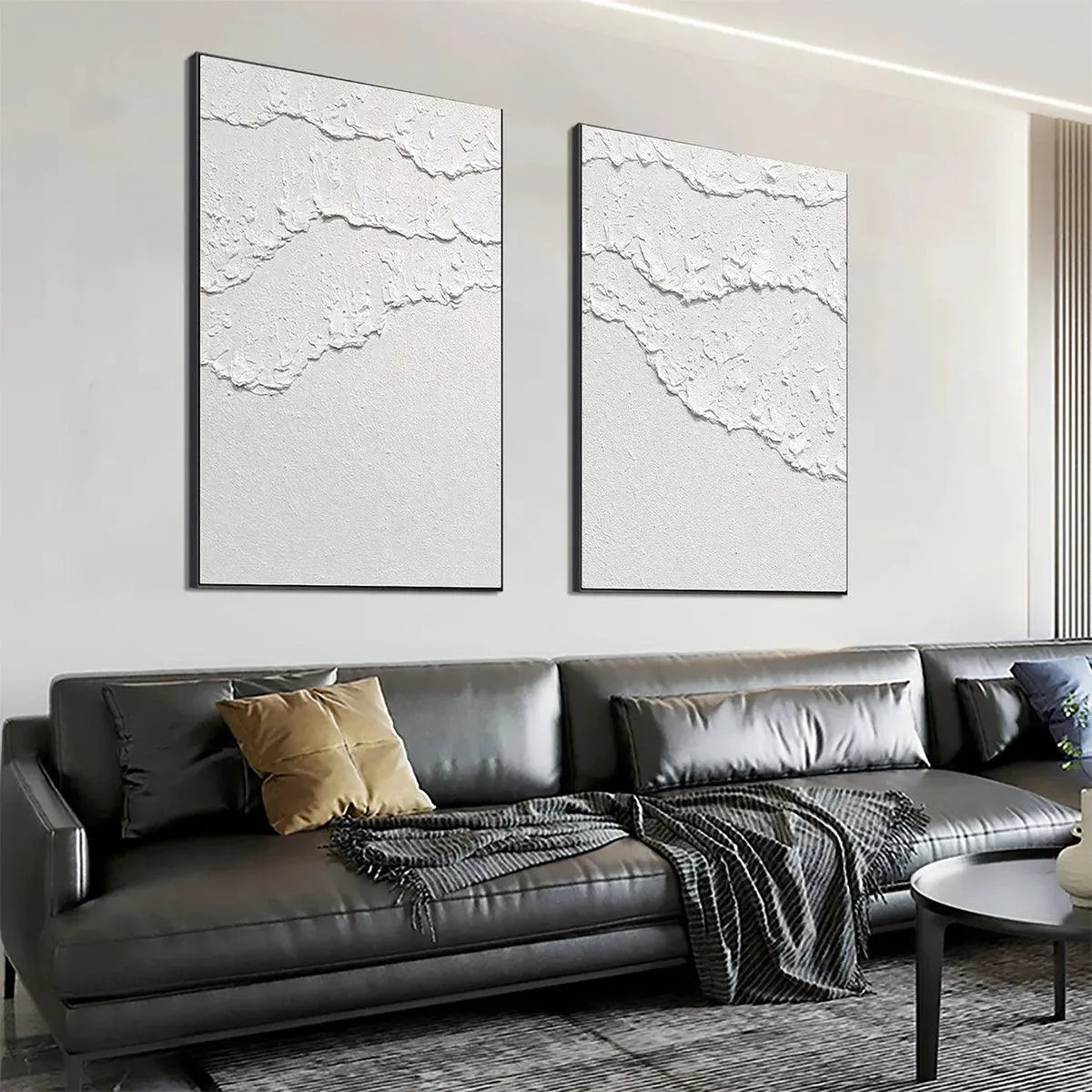 Isabella Rossi's White Waves Diptych: White textured abstract art on canvas, black frame, vertical wall decor.