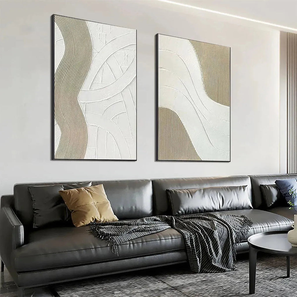 Textured White Lines Diptych: 2 minimalist paintings with raised beige & white lines in a living room.