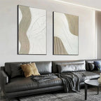 Textured White Lines Diptych: 2 minimalist paintings with raised beige & white lines in a living room.