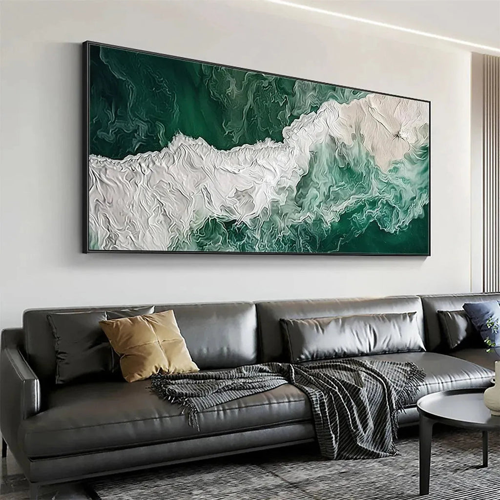 EMERALD FLOW: Green & white textured ocean painting above grey sofa, modern living room.