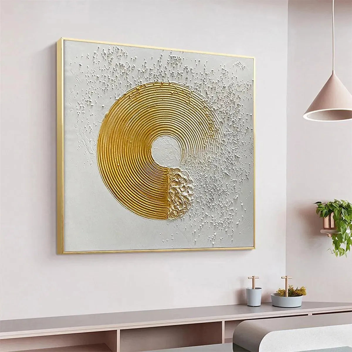 Textured gold concentric circle abstract painting with scattered white details on white background, 3D wall art.