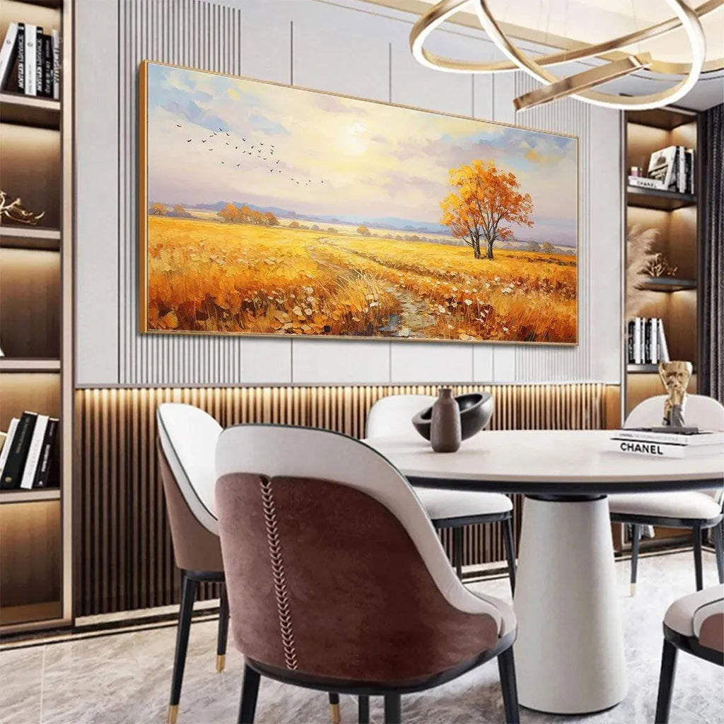 Golden Harvest original landscape painting featuring golden field at sunset with autumn tree above round white dining table.