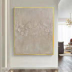 Textured beige abstract painting by Javier Ramirez, square wall art with gold frame, modern home decor, minimalist design.