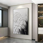 Modern white 3D impasto flower painting on black background, vertical wall art in contemporary interior.