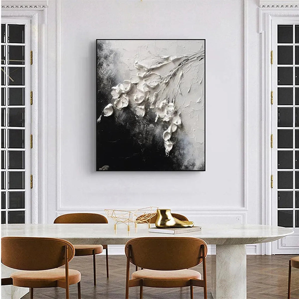 Isabella Rossi textured white floral impasto painting, square wall art with thick 3D blooms on black and white background.