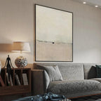 Javier Ramirez's Minimalist Earthscape vertical abstract painting in a modern living room, neutral tones.