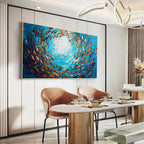 Oceanic Whirl painting by Chak Yu Lam, horizontal framed artwork with swirling school of fish, blue and orange, home decor.