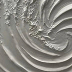 Close-up of Isabella Rossi's 'WHIRLWIND' textured white abstract painting, showing thick impasto swirl detail.