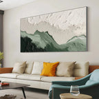 Sage River textured impasto abstract landscape in green & white, elevating a modern living room above a beige sofa.