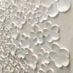 Blanc Bloom: textured white floral impasto painting with 3D effect, gold frame. Elegant and romantic artwork for bedrooms.