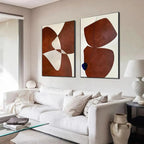 Brown abstract diptych wall art set of 2 vertical paintings with organic shapes in brown and off-white, gold frames