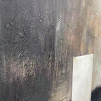Textured abstract painting with charcoal, beige, and brown hues, featuring a white rectangular element. Vertical wall art.