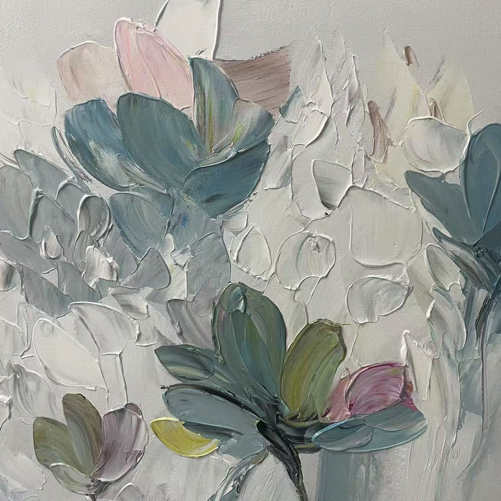 Close-up of Pastel Dream painting, showcasing thick impasto brushstrokes forming textured teal and pink flowers on canvas.