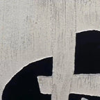 Javier Ramirez black and white abstract. Textured canvas art featuring contrasting geometric forms for modern home decor.