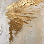 Close-up of textured abstract painting with golden wings on beige background, showcasing impasto detail.