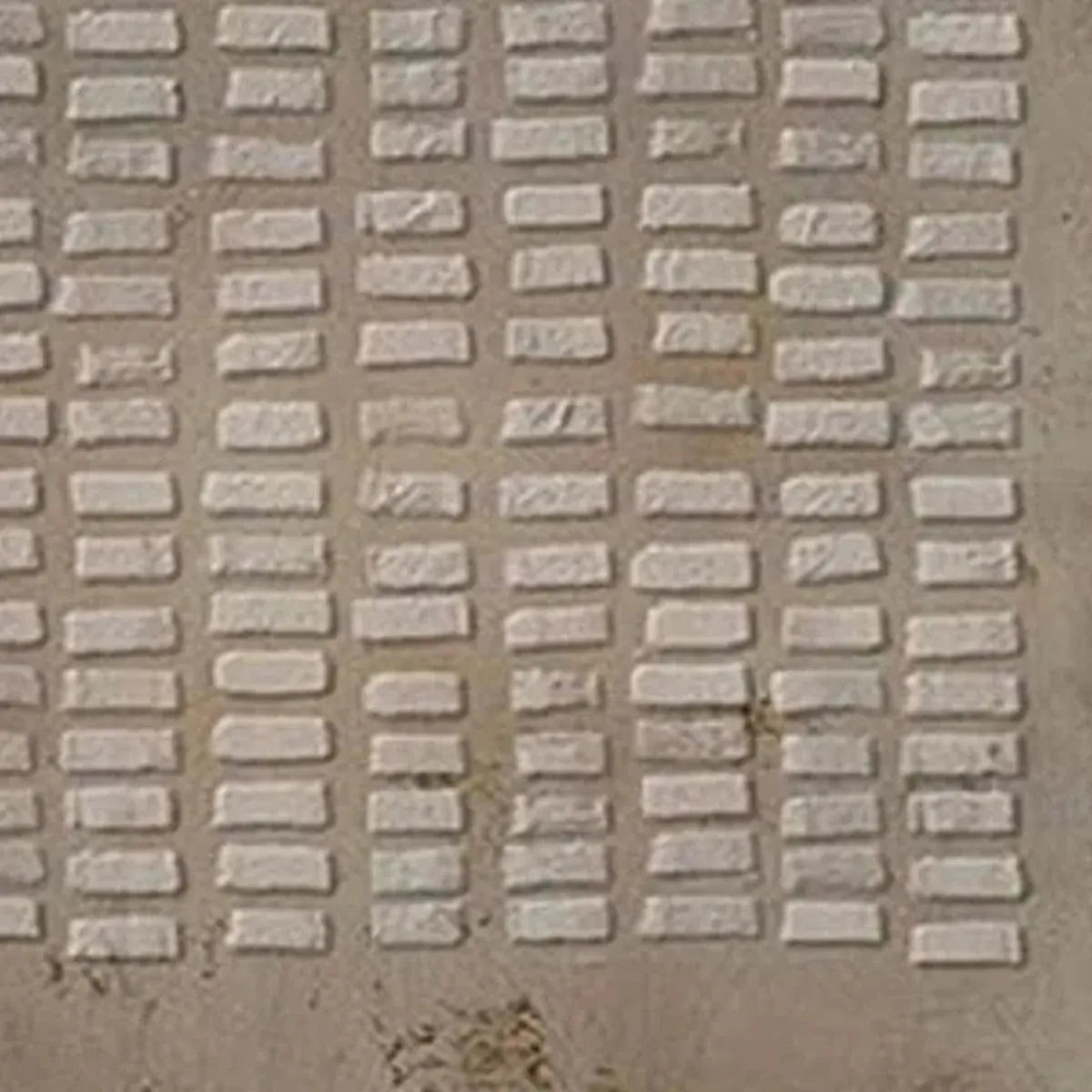 Textured Beige Grid painting by Javier Ramirez, featuring a minimalist grid pattern with textured beige blocks.