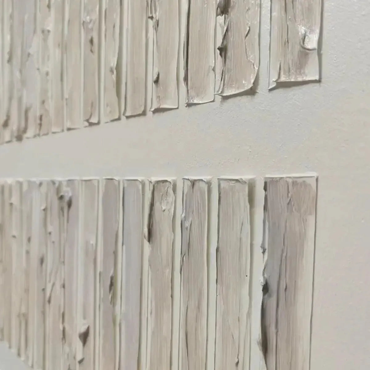 Close-up textured beige minimalist painting with thick, uneven vertical lines showcasing tactile surface detail.
