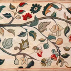 Liam O'Connell panoramic tapestry: flowering branch, red, peach, teal flowers on cream. Detailed floral design.