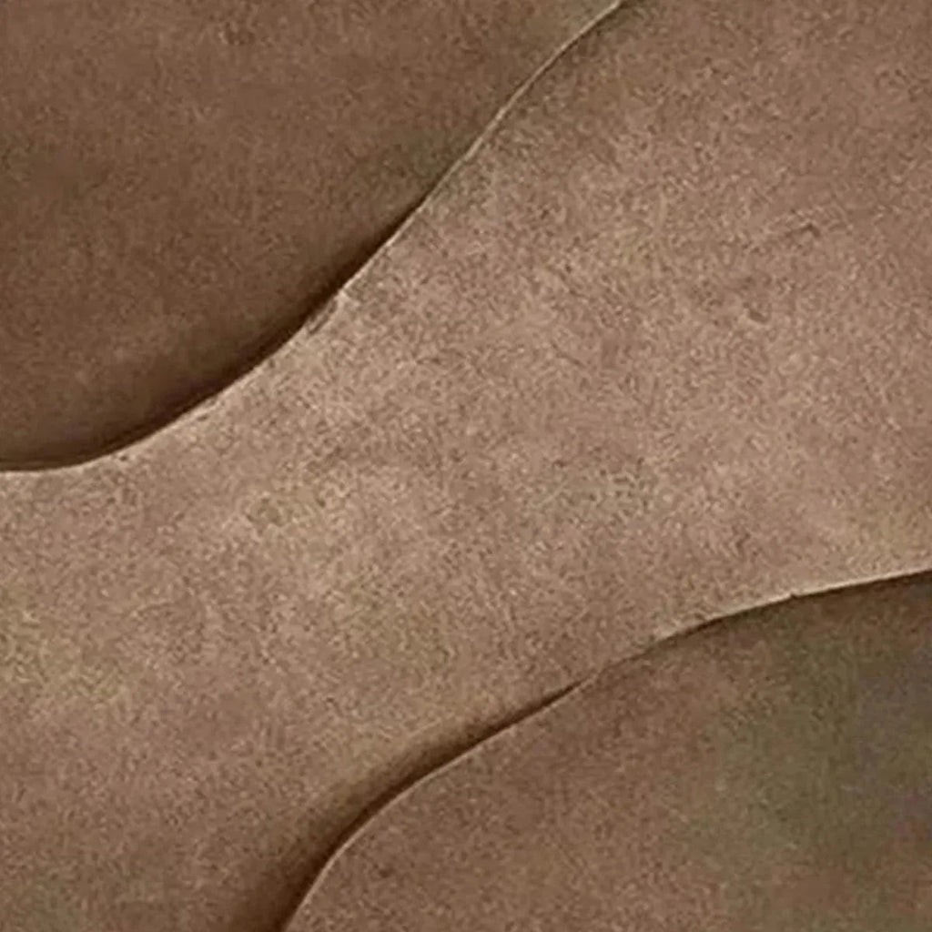 Close-up of brown textured abstract painting with coarse, swirling lines, showcasing earthy elegance. By Javier Ramirez.