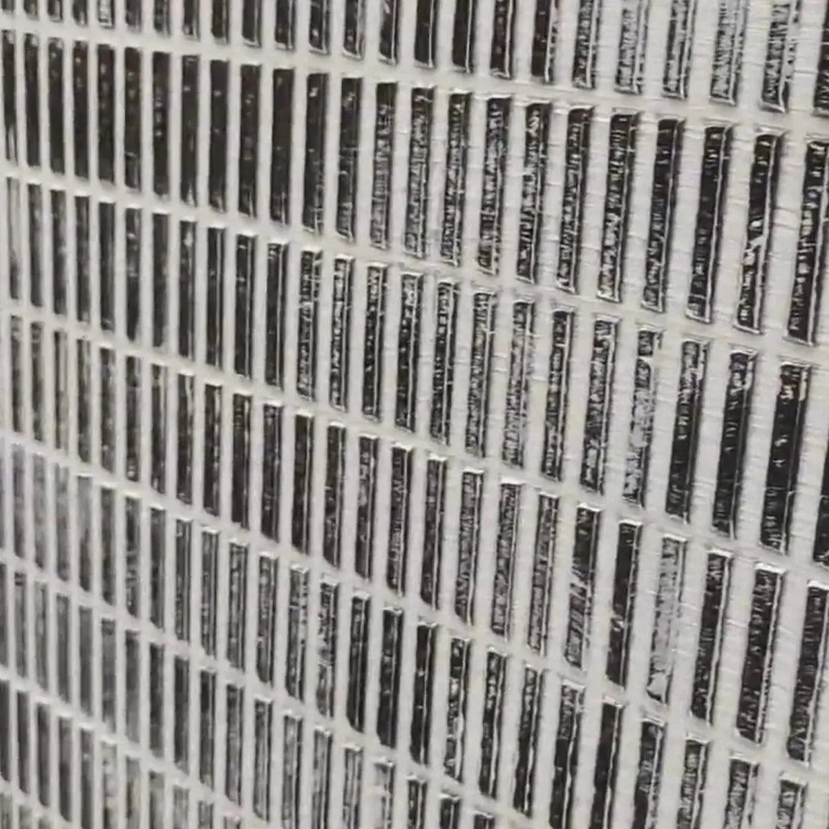 Minimalist textured grey and white painting with woven grid pattern close-up.
