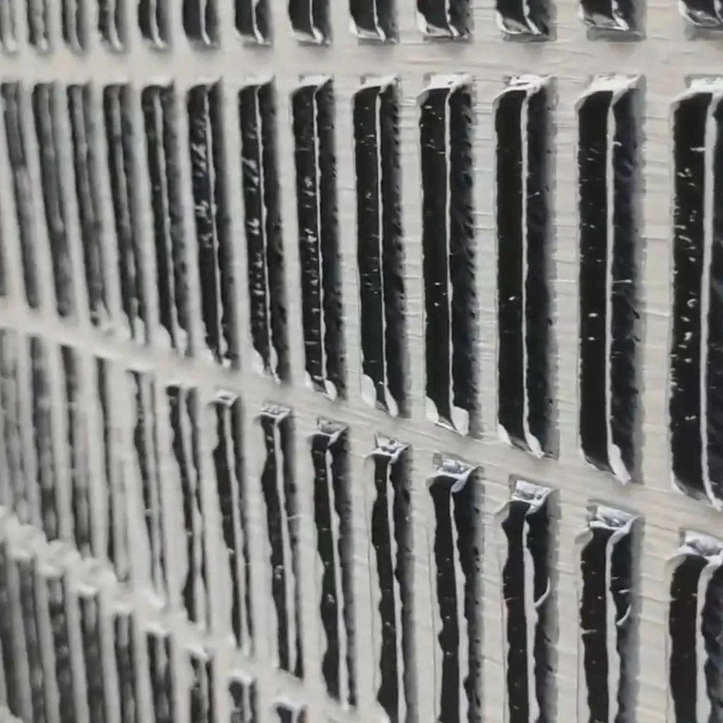 WOVEN TEXTURE painting, close-up of grey and white textured grid pattern by Javier Ramirez, showcasing dimensional detail.