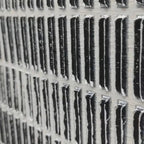 WOVEN TEXTURE painting, close-up of grey and white textured grid pattern by Javier Ramirez, showcasing dimensional detail.